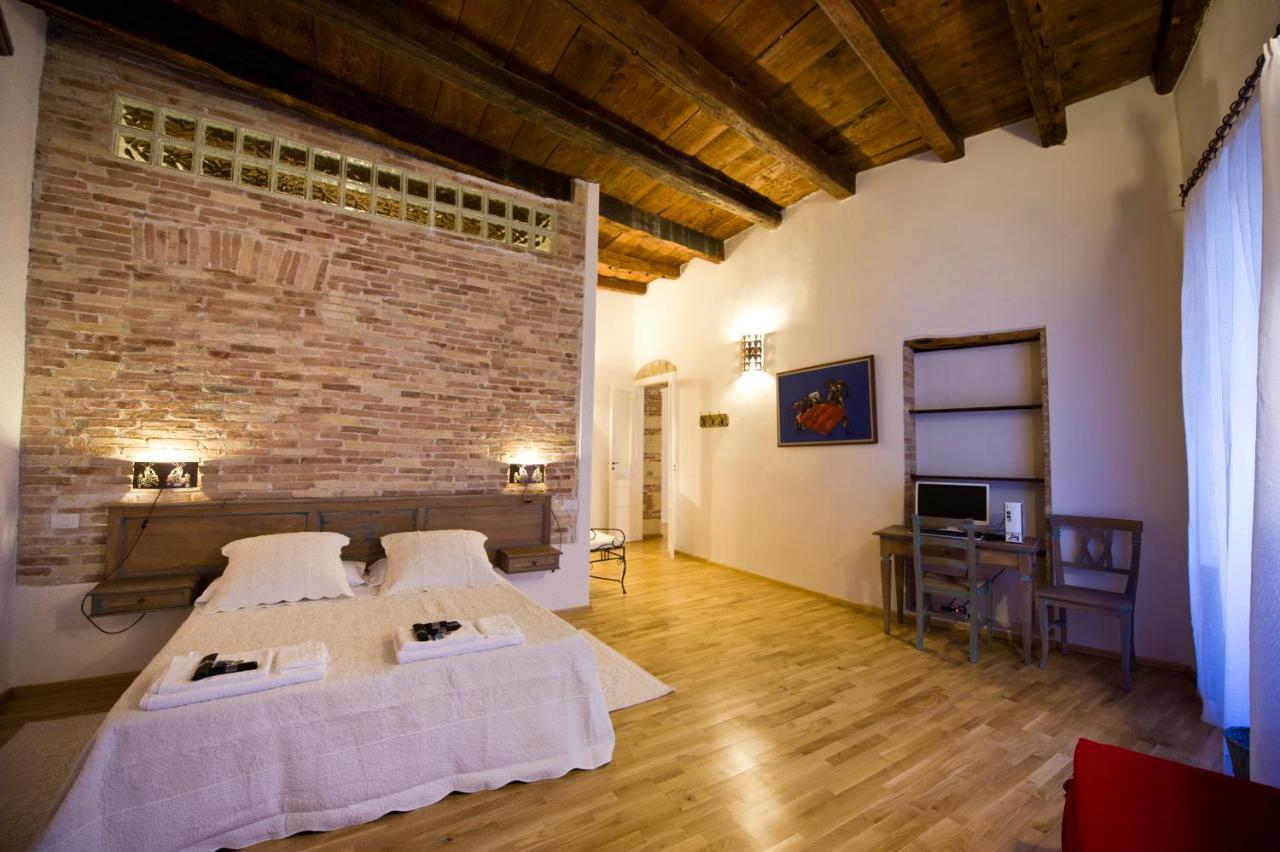 Castelletto Suites Cagliari Pokoj fotografie