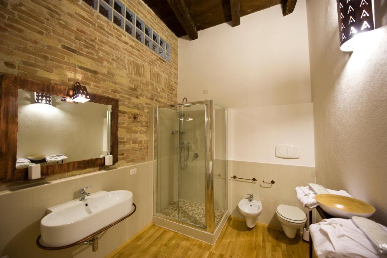 Castelletto Suites Cagliari Pokoj fotografie