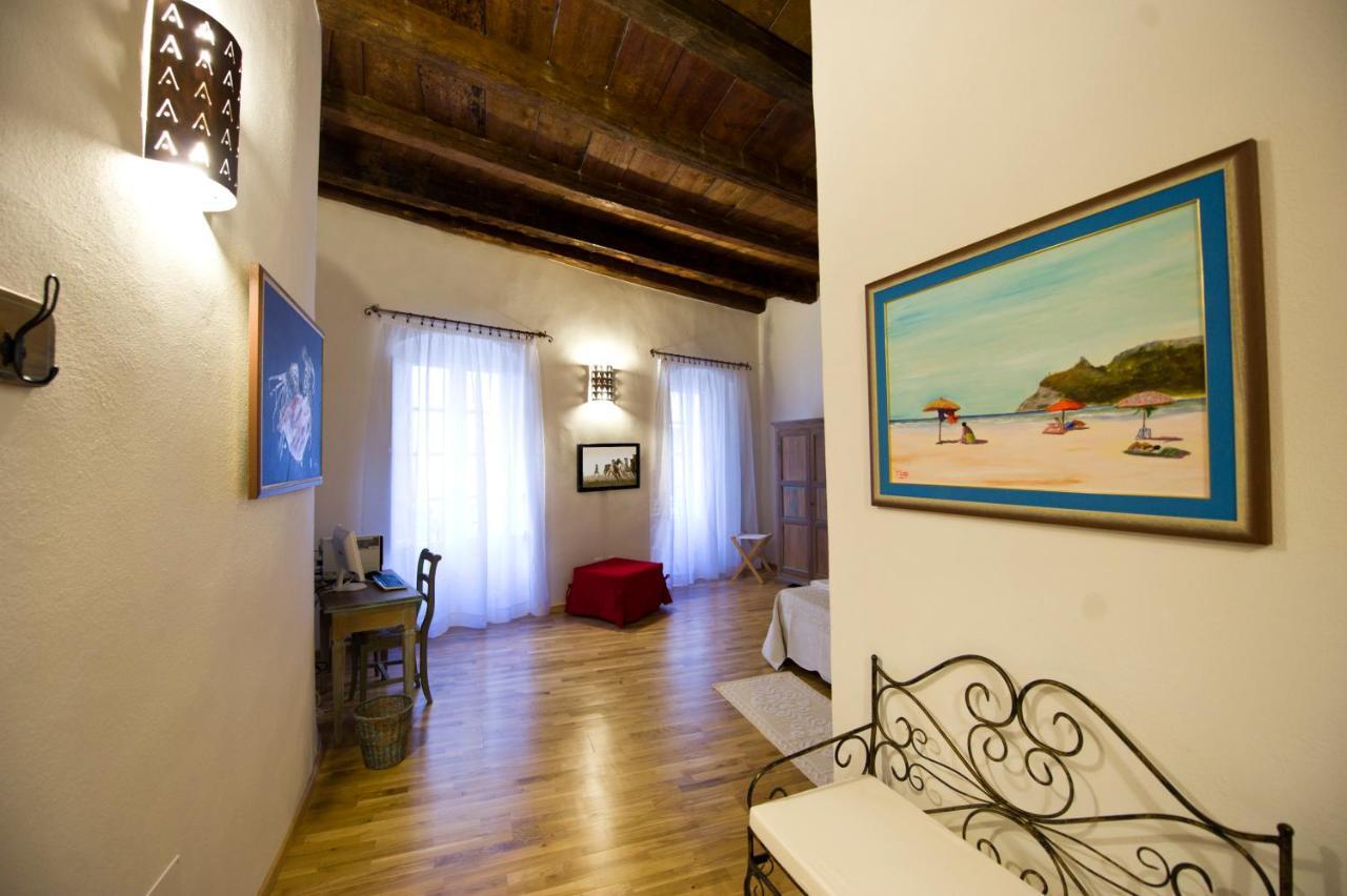 Castelletto Suites Cagliari Pokoj fotografie